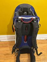 Front view of Kelty Pathfinder 3.0 child carrier backpack on kickstand