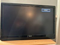 Front view of Philips LCD TV powered on, HDMI2 input displayed