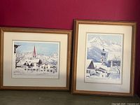 Both framed prints side by side