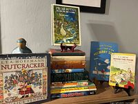 Group shot of all books displayed on shelf and stands