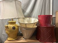 Group shot of lamp and five visible shades