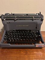 Front view showing keyboard, branding, overall body