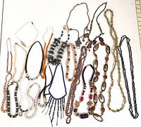 All 21 necklaces laid out for full view