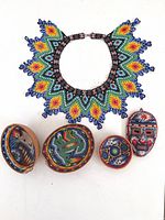 All five Huichol beaded items: necklace, three bowls, mask