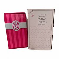 Outer and inner boxes showing Marie Osmond branding and Toddler series labeling