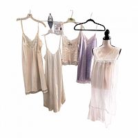 All five lingerie pieces hanging and on mannequin