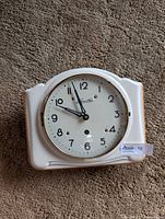 Front view showing dial, bezel and ceramic body