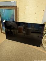 Front view of 40-inch TCL TV screen and bezel