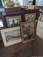 Group shot showing all four framed artworks