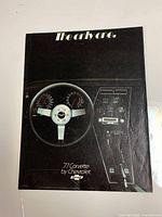 Front cover of 1977 Corvette brochure showing steering wheel graphic and title