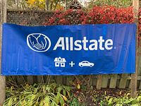 Full frontal view of banner displaying Allstate logo and icons