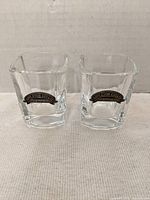 Pair of Appleton Estate square shot glasses front view