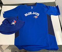 Shirt and bucket hat laid flat showing overall appearance