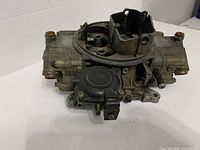 Top and side view of Holley carburetor showing vacuum secondary unit and throttle bores
