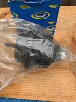 Motor mount sealed in plastic in front of damaged Marmon Ride Control box