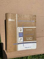Front cover of Tune-Up II binder showing Mitchell Manuals branding and subject areas