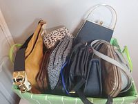 Assorted bags packed in green bin