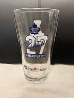 Front of glass showing Maple Leafs logo, #27, Frank Mahovlich facsimile signature and text