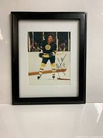 Full view of framed autographed photo
