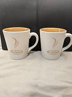 Pair of Tim Hortons limited edition mugs front view