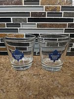 Two Toronto Maple Leafs lowball glasses front view