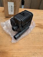 Leak detection pump front and side view on bubble wrap