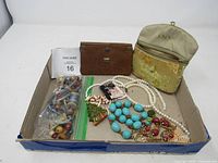 Tray with pouch, wallet, assorted necklaces and jewellery pieces