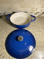 Pot with lid removed showing interior enamel