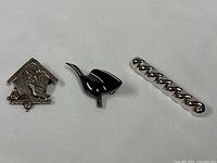 Front view of all three pins