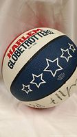 Full view of tri-color Harlem Globetrotters basketball