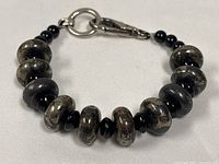 Full view of bracelet showing bead pattern and clasp