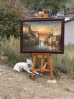 Full view of framed Venice oil painting on easel outdoors