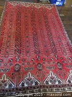 Full view of rug showing pattern and borders