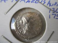 Obverse of silver denarius showing bust of Empress Faustina II in 2×2 holder