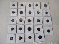 Overview of 24 coins in 2x2 holders arranged in five rows