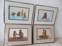 All four framed prints grouped together