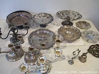 Group shot of all silver-plate items on table