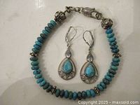 earrings and bracelet full view