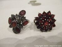 Front view showing both sterling silver rings with red stones