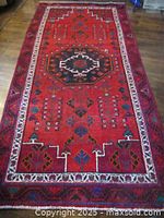 Full view of Persian Lori rug showing overall design and colors
