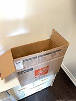 Closed small Home Depot box for CDs