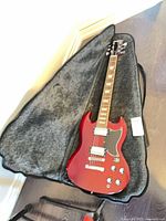 Guitar inside open case