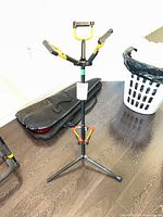 Full view of steel tripod guitar stand with padded neck cradles