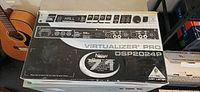 Box top showing Behringer Virtualizer Pro DSP2024P graphics and model information