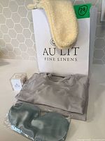 Complete gift set with loungewear top, sleep mask, socks, Au Lit bag