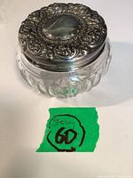 Jar assembled showing ornate sterling lid and cut glass body