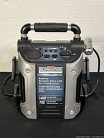 Front view showing full unit and attached work light