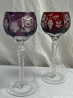 Full view of both amethyst and ruby red goblets side by side