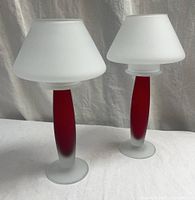 Full view of both frosted glass candle holders showing shades and bases
