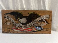 Full front view of wood plaque showing entire eagle and banner design